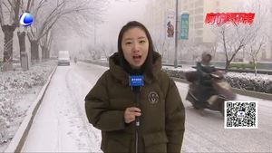 霾雪共同来袭 市民出行应加强防护