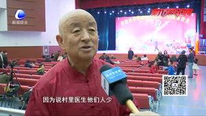 钟情京剧数十年 一把胡琴谱人生