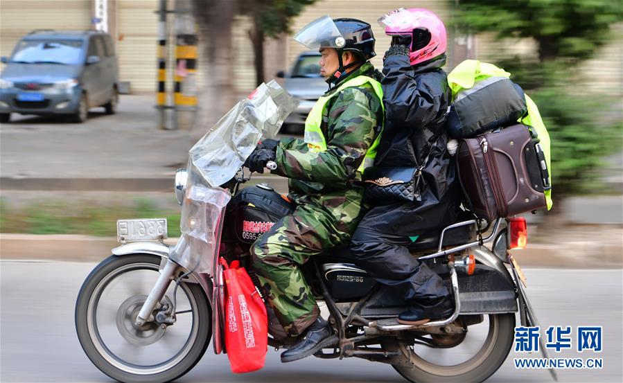 (新春走基层·关注春运)(1)向着家的方向骑行