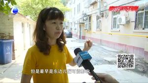 零距离·热线：单元门口污水井堵塞 污水外溢臭气熏天