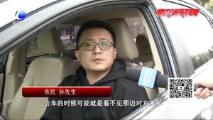 爱民西道绿化带过高 行人盼修剪