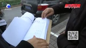 热心市民外出捡到档案袋 记者帮寻归还失主