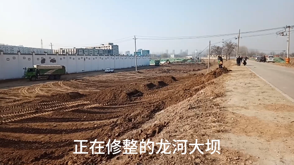 正在修整的龙河大坝